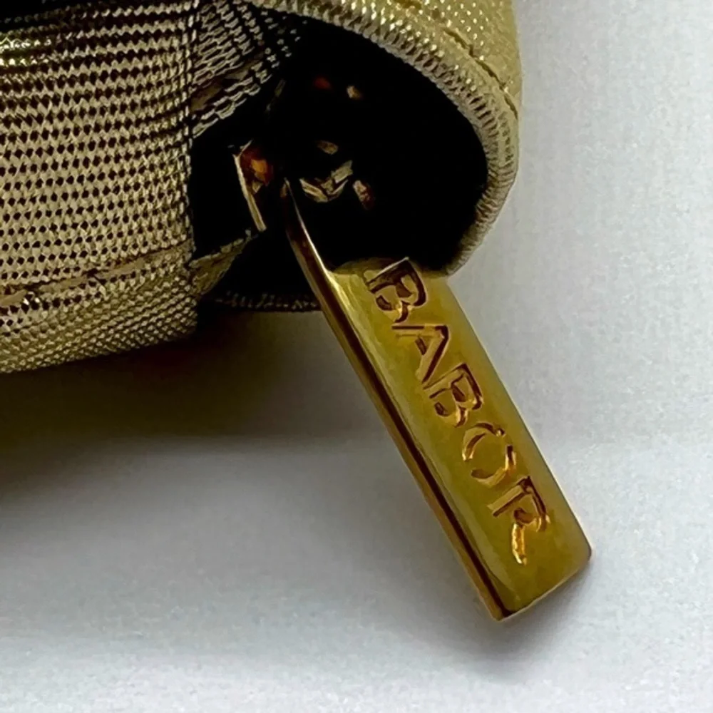Babor gold & navy blue make up clutch